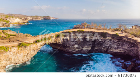 Landscape over Broken Beach in Nusa Penida, Indonesia Angel's BillaBong Beach. Popular tourist Landscape over Broken Beach in Nusa Penida, Indonesia Angel's BillaBong Beach. Popular tourist 61730872