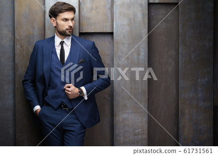 indoor photo of young handsome stylish businessman wearing suit 61731561
