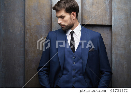 indoor photo of young handsome stylish businessman wearing suit 61731572