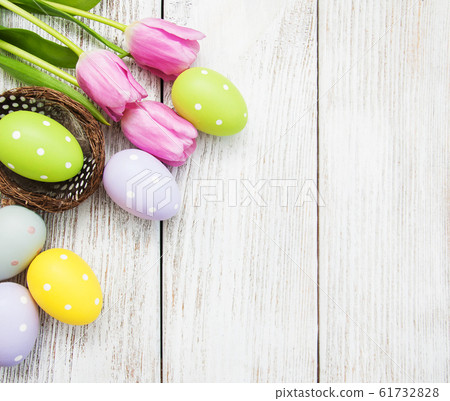 Easter eggs in a nest Easter eggs in a nest 61732828