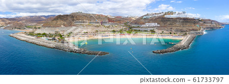 Panorama from the air of the beautiful Amadores beach at Gran Canaria 61733797