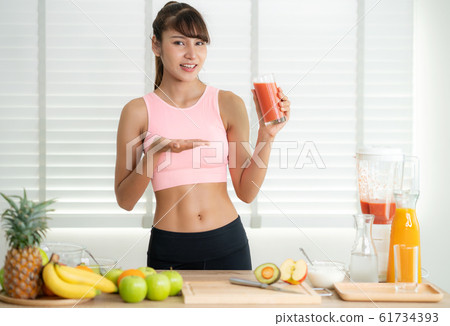 Asian girl prepare material for make a smoothie 61734393