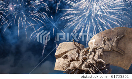 Fireworks over the Monument to the heroes First World War in Victory Park on Poklonnaya Hill, Moscow, Russia Fireworks over the Monument to the heroes First World War in Victory Park on Poklonnaya Hill, Moscow, Russia 61735801