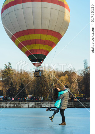 Bride and groom against the background of a frozen 61736139