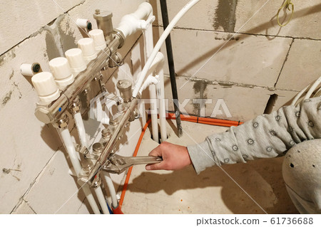 Underfloor heating is mounted on a pipeline Underfloor heating is mounted on a pipeline 61736688