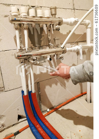 Underfloor heating is mounted on a pipeline Underfloor heating is mounted on a pipeline 61736689