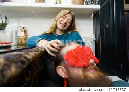 Loving couple man and woman having fun at home Loving couple man and woman having fun at home 61738787