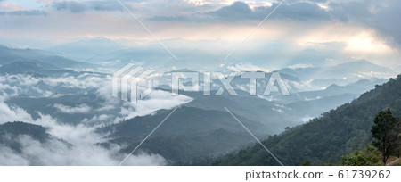Mountain peaks sunlight landscape Mountain peaks sunlight landscape 61739262