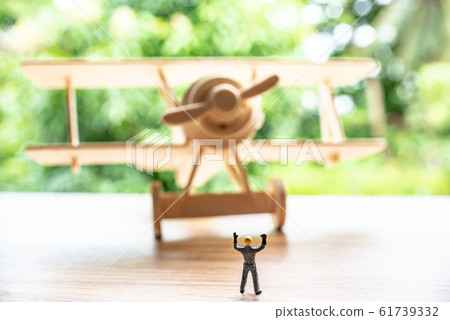 Retro wooden airplane toy with miniature 61739332