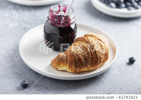 croissant and blueberry jam croissant and blueberry jam 61741925
