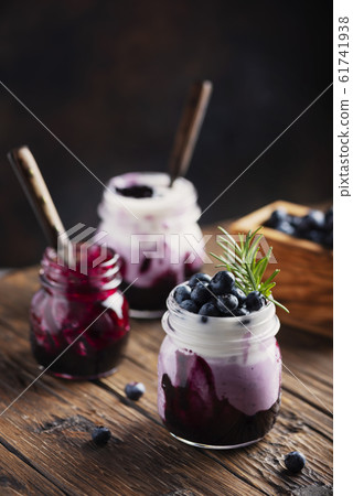 Sweet healthy yogurt with blueberry Sweet healthy yogurt with blueberry 61741938
