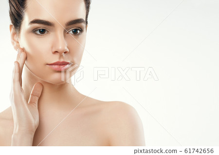 Beauty and Spa Concept. Beautiful Young Woman with 61742656