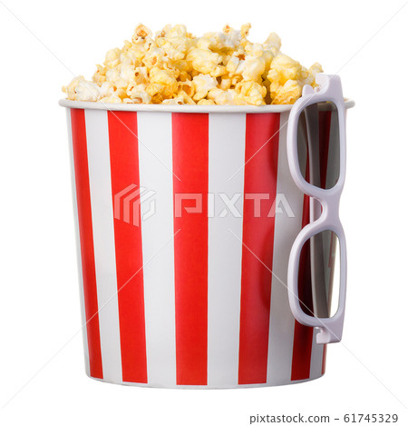 Paper striped bucket with popcorn and 3D glasses isolated on white background Paper striped bucket with popcorn and 3D glasses isolated on white background 61745329