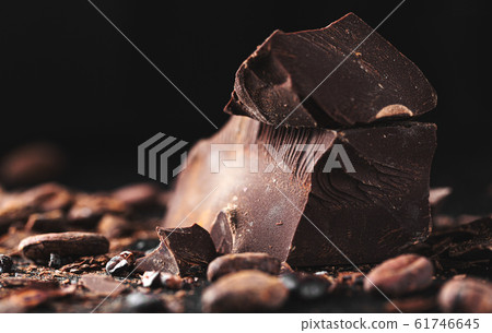 Dark chocolate chunks on table 61746645