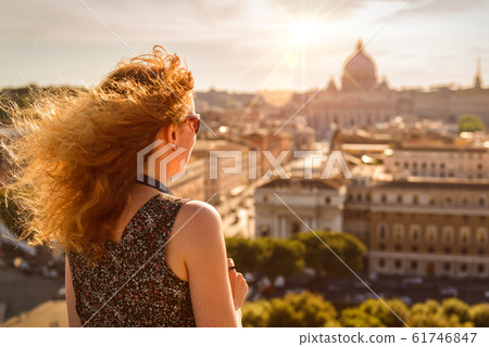 Young pretty woman admiring the view of Rome, 61746847