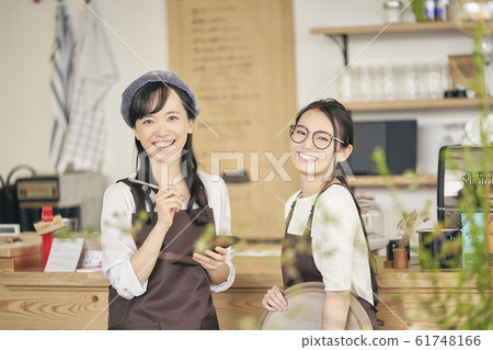 Cafe shop clerk woman Cafe shop clerk woman 61748166