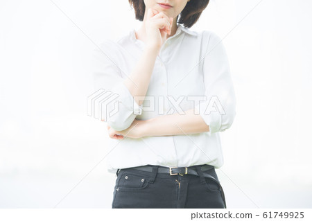 A young woman thinking A young woman thinking 61749925
