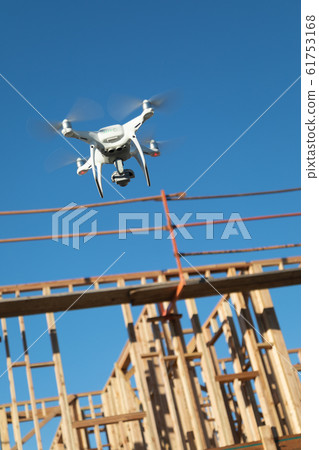 Drone Quadcopter Flying and Inspecting Wood 61753168