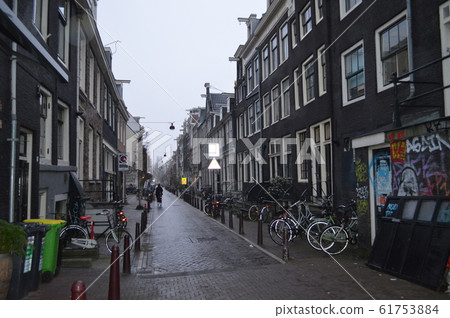 There are many bicycles in Amsterdam, the Netherlands 61753884