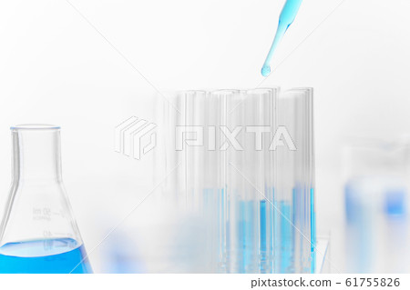 Scientist use pipette drops chemical liquid in test tube in laboratory 61755826
