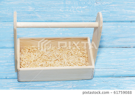 Empty wooden box. Made of pine, on a light white Empty wooden box. Made of pine, on a light white 61759088