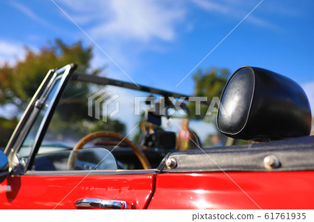 Red open car 61761935