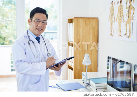Cheerful Male Therapist Portrait Cheerful Male Therapist Portrait 61763597