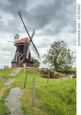Windmill Wynhamster Kolk.near the town of Leer, East Frisia, Lower Saxony, Germany Windmill Wynhamster Kolk.near the town of Leer, East Frisia, Lower Saxony, Germany 61763865
