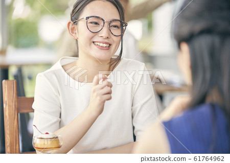 Cafe woman two Cafe woman two 61764962