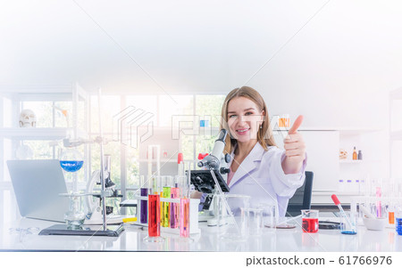 pretty scientist work reserching in chemical laboratory 61766976
