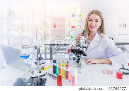 pretty scientist work reserching in chemical laboratory 61766977