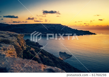 beautiful sunset and seascape view of Golden Bay, 61768298