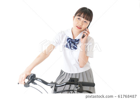 Young student using a bicycle 61768487