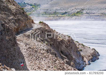 Picture of trekking foothpath in mountains 61769200