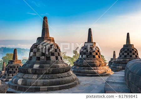 Borobudur temple at sunrise, Java, Indonesia Borobudur temple at sunrise, Java, Indonesia 61769841