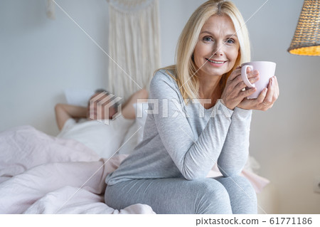 Morning tea for woman in bedroom stock photo 61771186