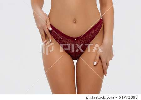 Faceless hot lady with hands on lingerie Stock Photo 61772083