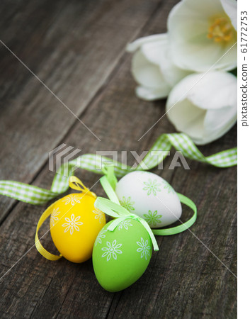 Easter eggs and tulips 61772753