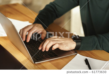 Unrecognizable Guy Using Laptop Typing Working In Modern Office, Cropped Unrecognizable Guy Using Laptop Typing Working In Modern Office, Cropped 61773630