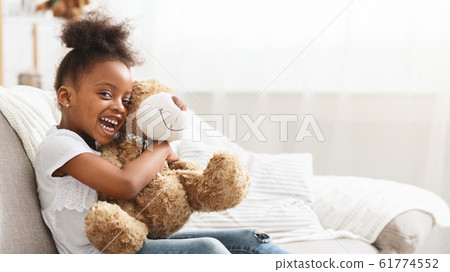 Cute Black Girl Hugging Teddy Bear Home Interior Stock Photo 61774552 Pixta