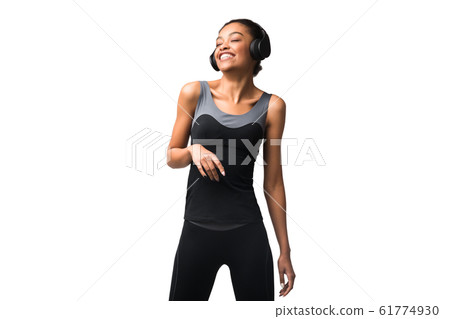 Girl In Headphones Dancing Listening To Workout Playlist In Studio Girl In Headphones Dancing Listening To Workout Playlist In Studio 61774930