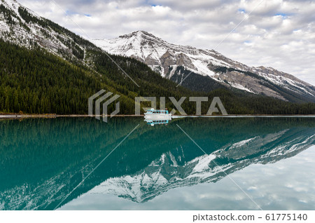 Ferry boat sailing to the Spirit Island on Maligne 61775140