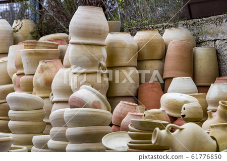 freshly made pots clay jugs for flowers 61776850