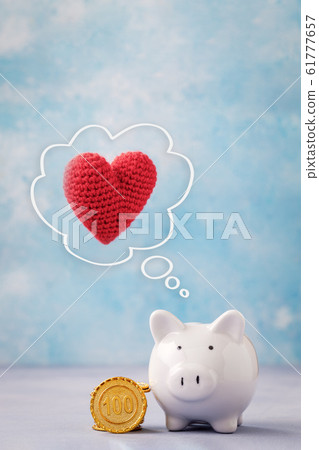 Piggy bank and heart Piggy bank and heart 61777657