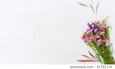 floral background wildflower bouquet white wooden 61782154