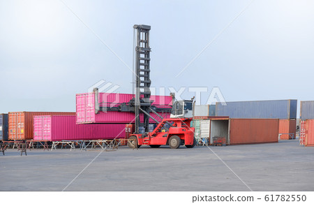 Container handlers in the harbor, transportation Container handlers in the harbor, transportation 61782550