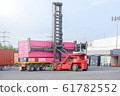 Container handlers are loading containers into 61782552