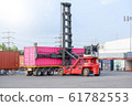 Container handlers are loading containers into 61782553
