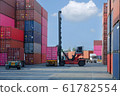 Container handlers are loading containers into 61782554
