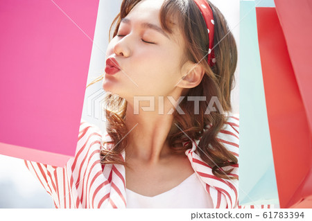 Women enjoy shopping 61783394